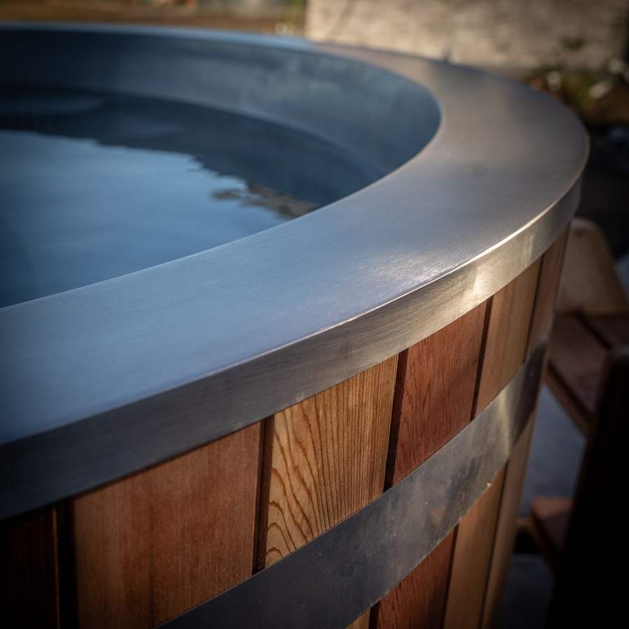 The Legendary Ledge, broad brushed stainless steel rim over cedar staves
